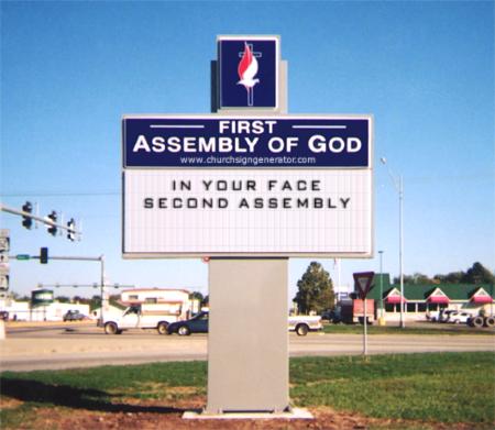 'First Assembly of God' church sign with the message 'IN YOUR FACE, SECOND ASSEMBLY'.